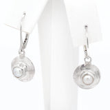 Pearl Dangle earrings on Covex Back