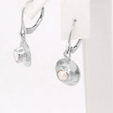 Pearl Dangle earrings on Covex Back